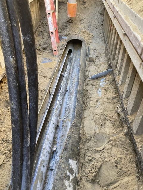 Electric cables laid in a sand-bedded trench